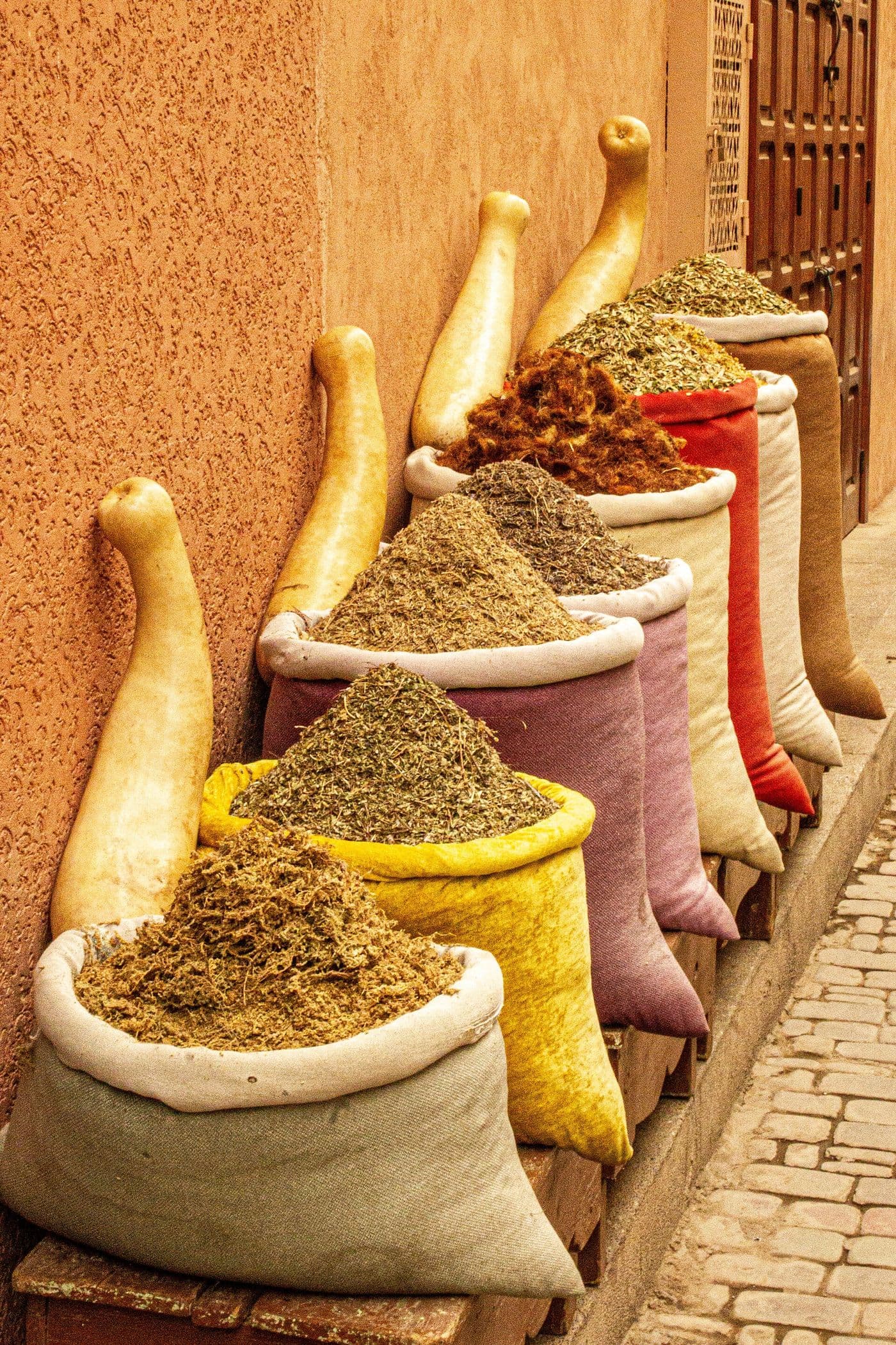 Cones of Moroccan spices at a market stall